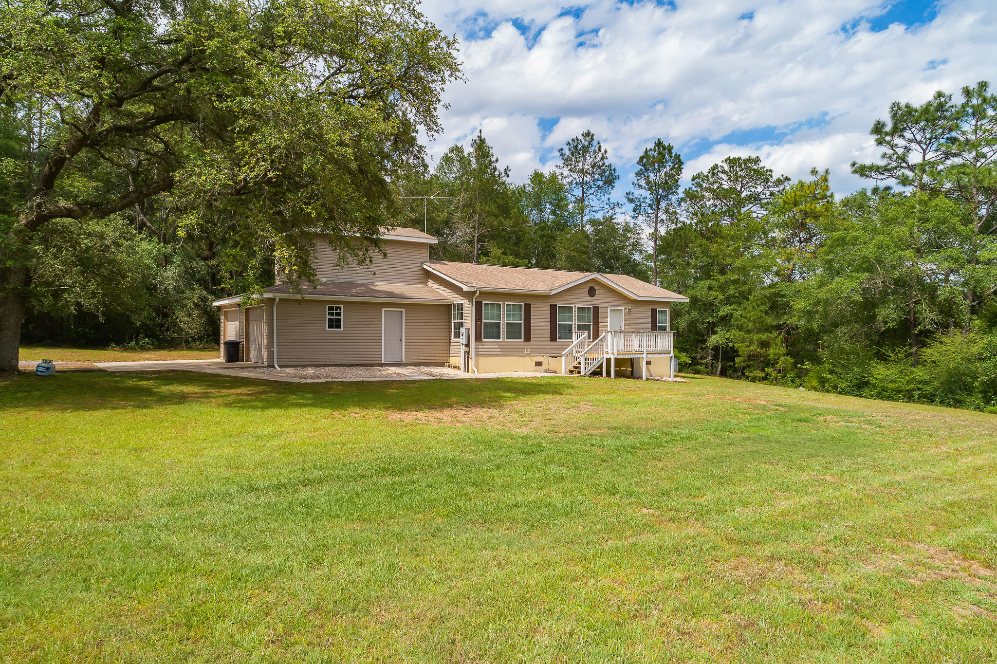 2157 Dr Nelson Road DeFuniak Springs, FL 32433 - Photo 3 of 23 a house view with a swimming pool