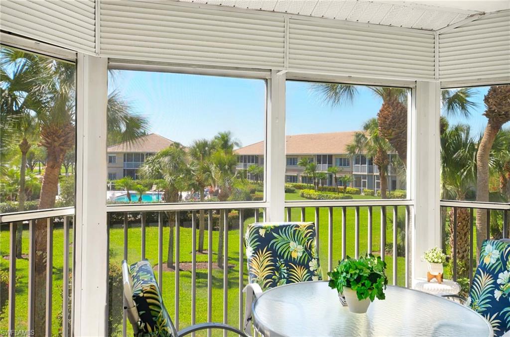 9022 Michael Circle, Unit 2210 Naples, FL 34113 - Photo 24 of 36 a view of a balcony with plants