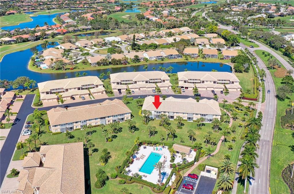 9022 Michael Circle, Unit 2210 Naples, FL 34113 - Photo 31 of 36 an aerial view of a houses with outdoor space