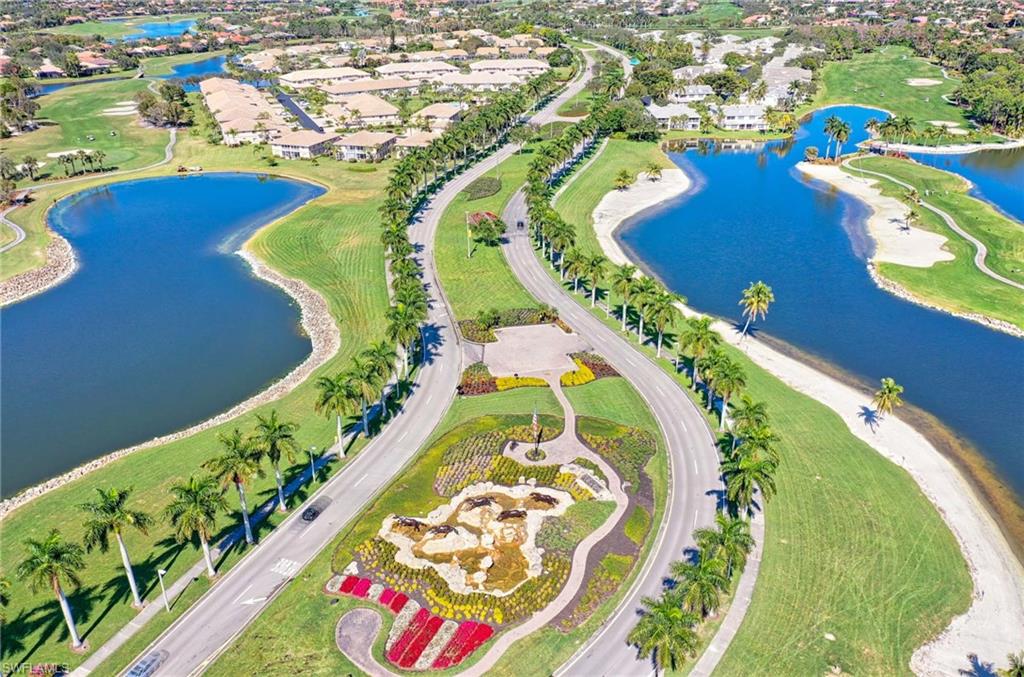 9022 Michael Circle, Unit 2210 Naples, FL 34113 - Photo 35 of 36 an aerial view of a swimming pool