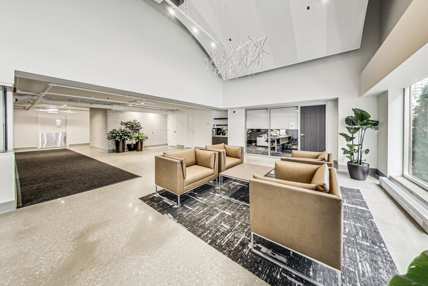 111 South Morgan Street, Unit 510 Chicago, IL 60607 - Photo 30 of 38 a living room with furniture and a large window