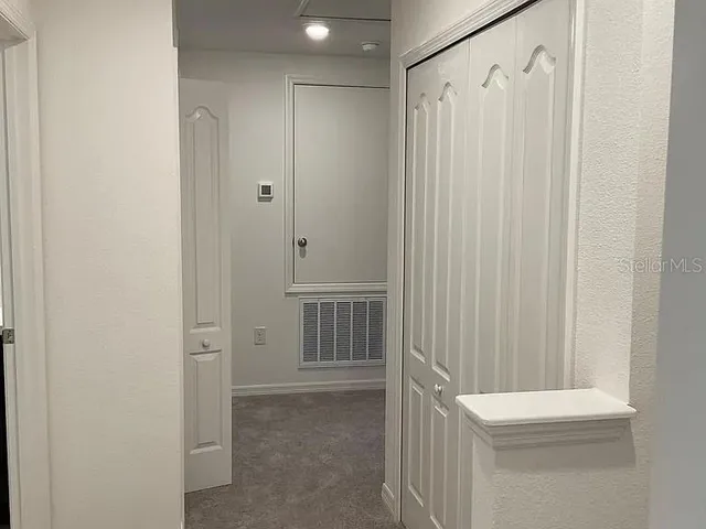 a bathroom with a shower and a toilet