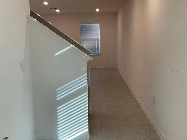 a hallway with stairs