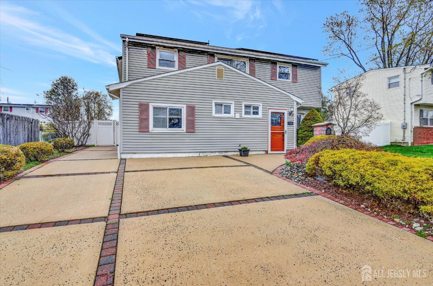 12 Albert Drive Old Bridge, NJ 08857 - Photo 16 of 20 a front view of a house with a yard