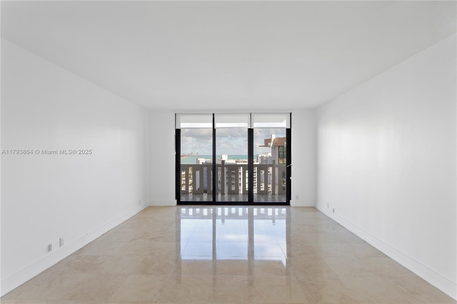 1121 Crandon Boulevard, Unit E1204 Key Biscayne, FL 33149 - Photo 11 of 21 wooden floor in an empty room with a window