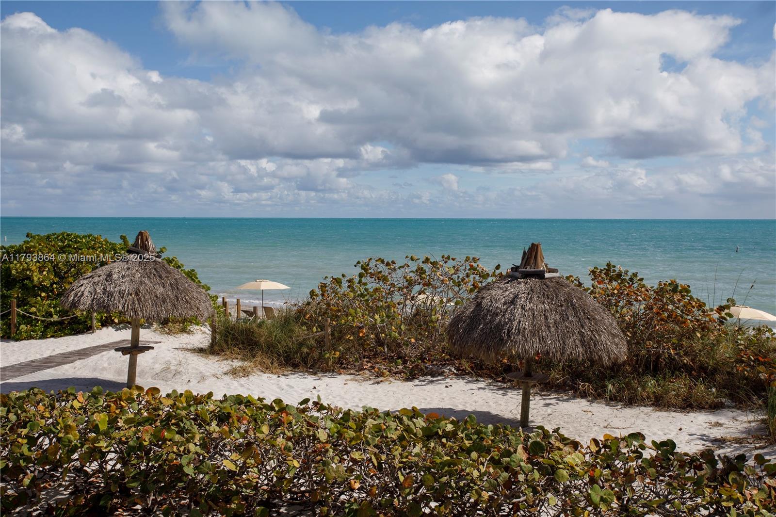 1121 Crandon Boulevard, Unit E1204 Key Biscayne, FL 33149 - Photo 20 of 21 a view of a lake and outdoor space