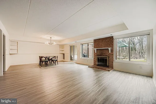 a kitchen with a sink and refrigerator