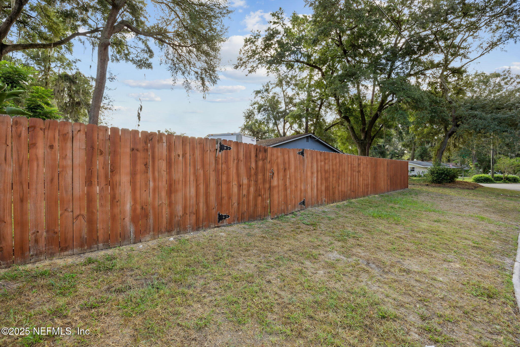 6305 Wuthering Heights Road Jacksonville, FL 32211 - Photo 7 of 53 a view of wooden fence