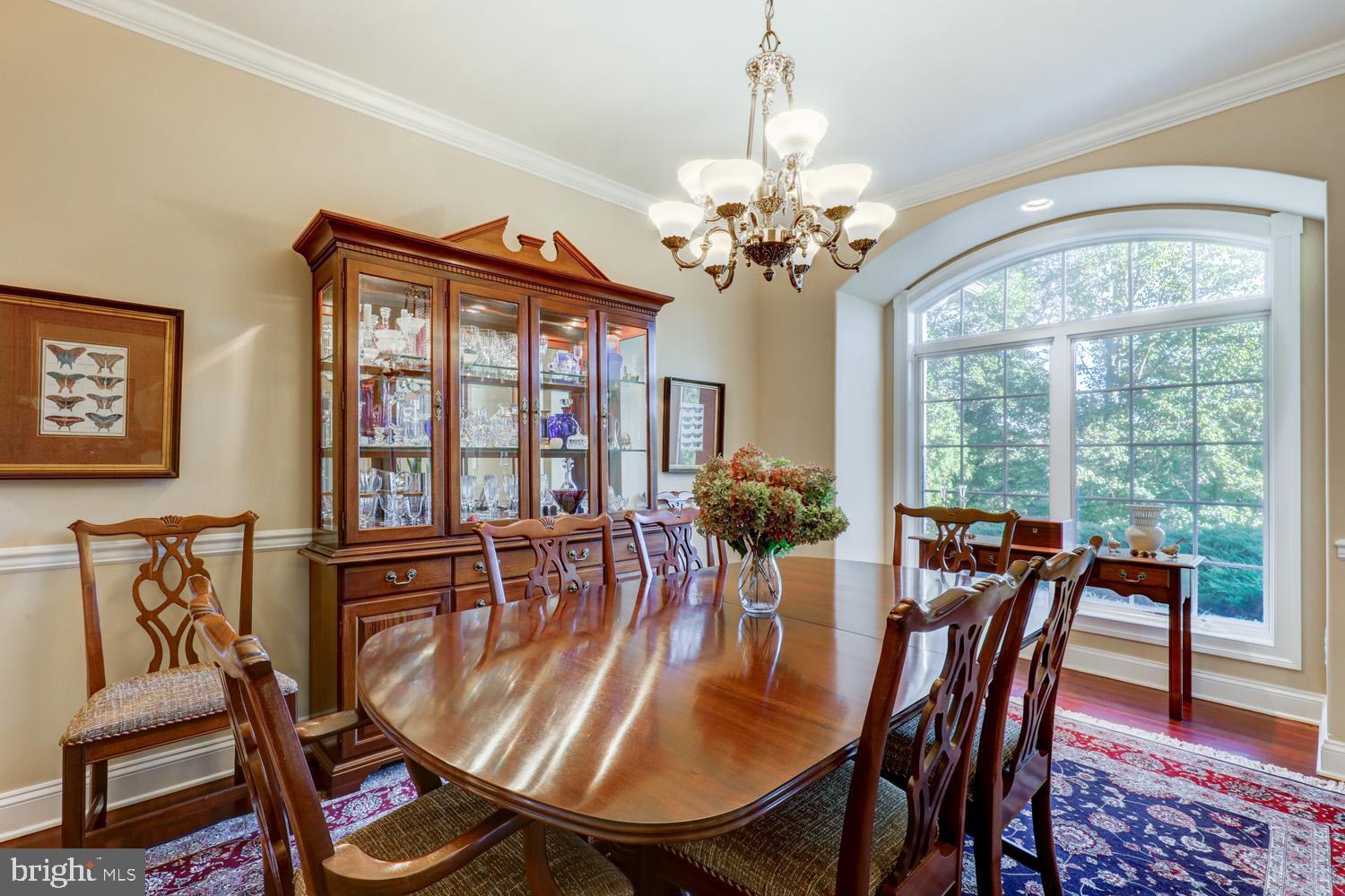 2326 Conestoga Road Chester Springs, PA 19425 - Photo 12 of 85 a view of a dining room with furniture wooden floor and chandelier