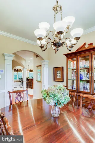 a kitchen with a sink and large window