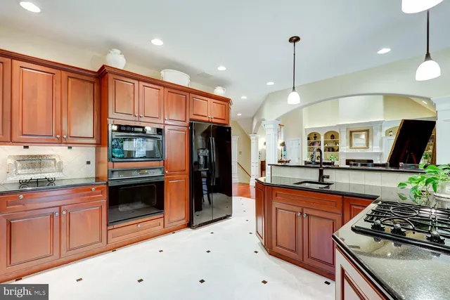 a living room with furniture fireplace and flat screen tv
