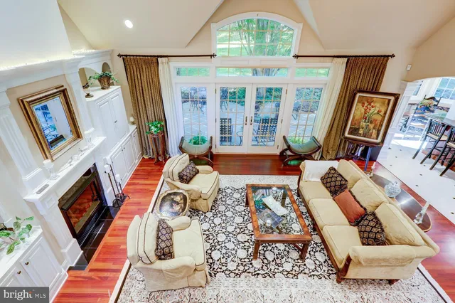 a front view of a house with garden and porch