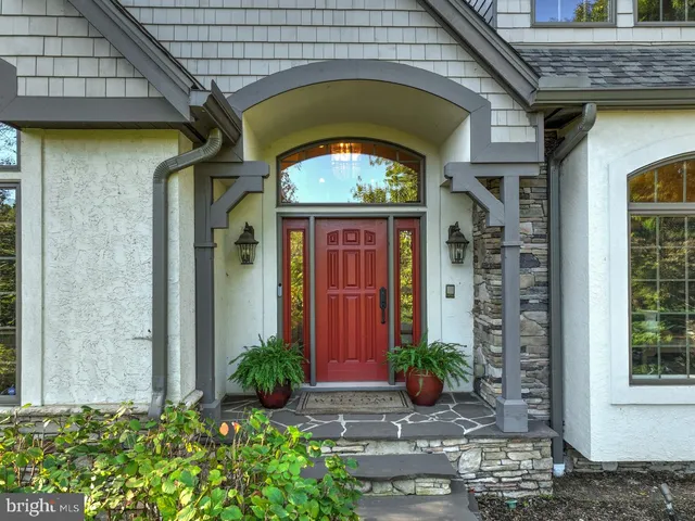 a view of a kitchen with stainless steel appliances granite countertop a stove top oven