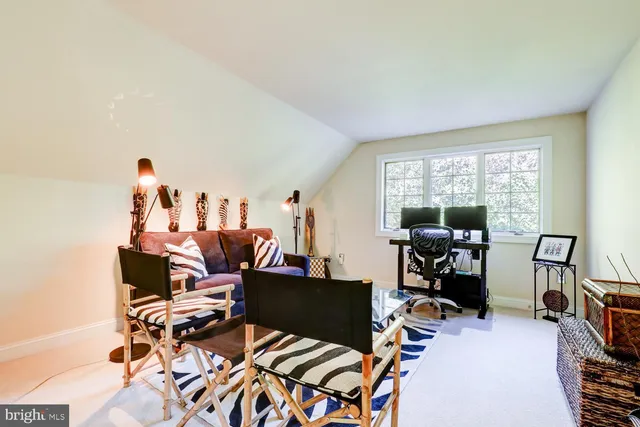 a view of yard with seating area and green space