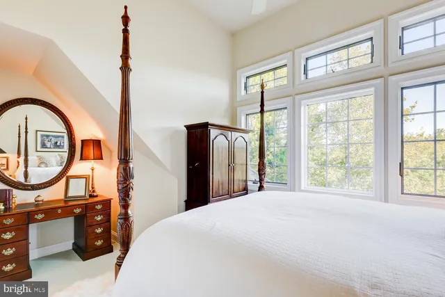 a view of a patio with table and chairs and potted plants