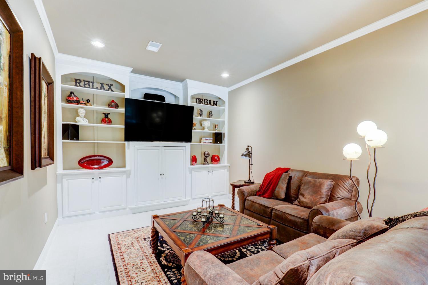 2326 Conestoga Road Chester Springs, PA 19425 - Photo 58 of 85 a living room with furniture and a flat screen tv
