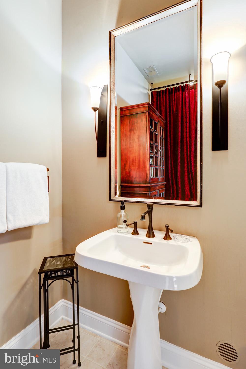 2326 Conestoga Road Chester Springs, PA 19425 - Photo 61 of 85 a bathroom with a sink and a mirror