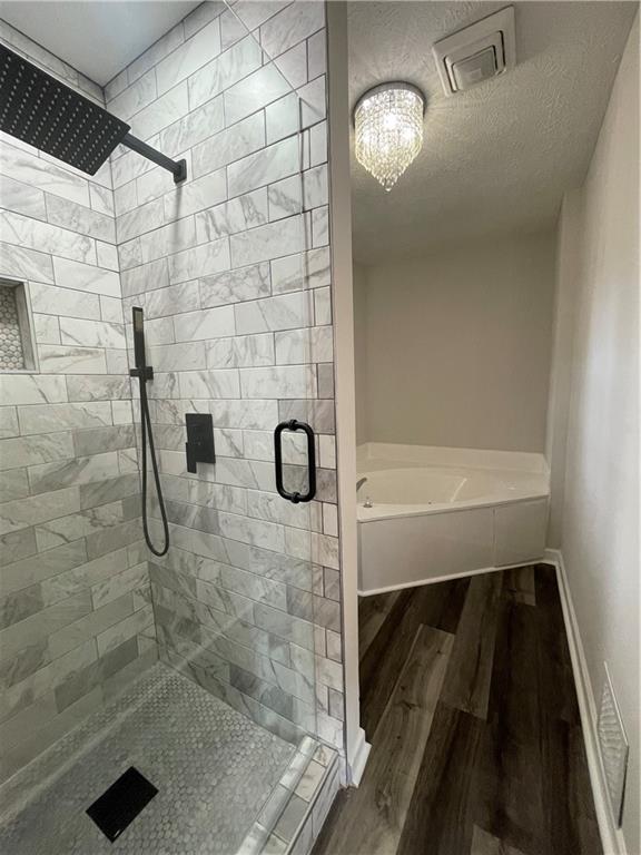 3325 Estate Lake Drive Fairburn, GA 30213 - Photo 12 of 17 a bathroom with a shower