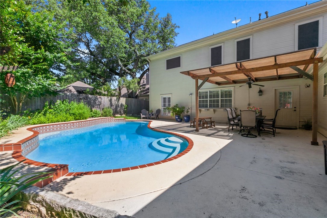 a view of outdoor space yard swimming pool and patio