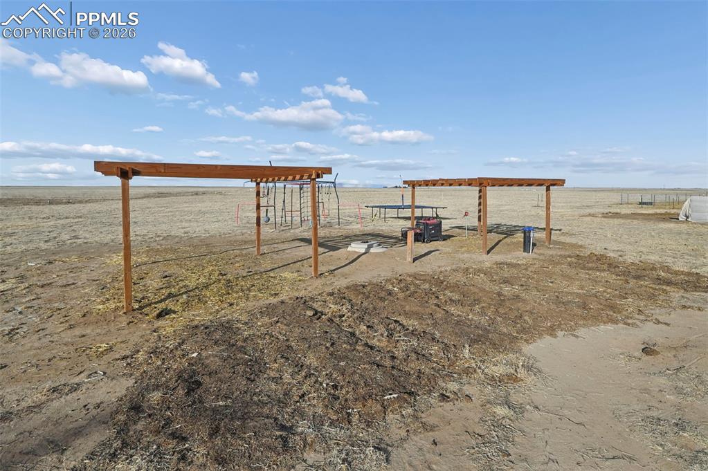 9800 Boone Road Yoder, CO 80864 - Photo 19 of 31 a view of a ocean with beach