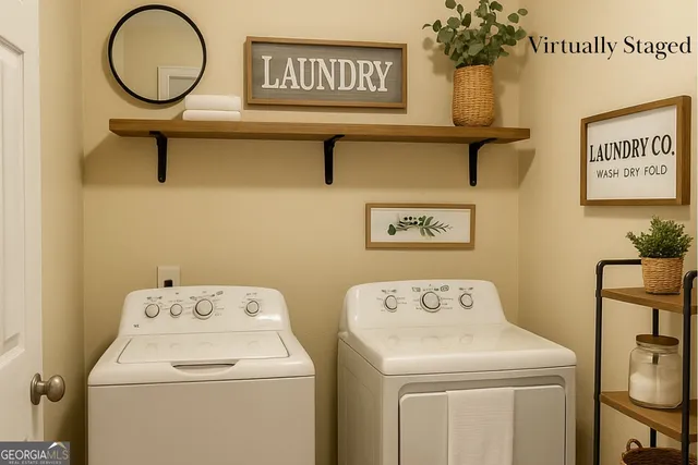 a utility room with dryer and washer