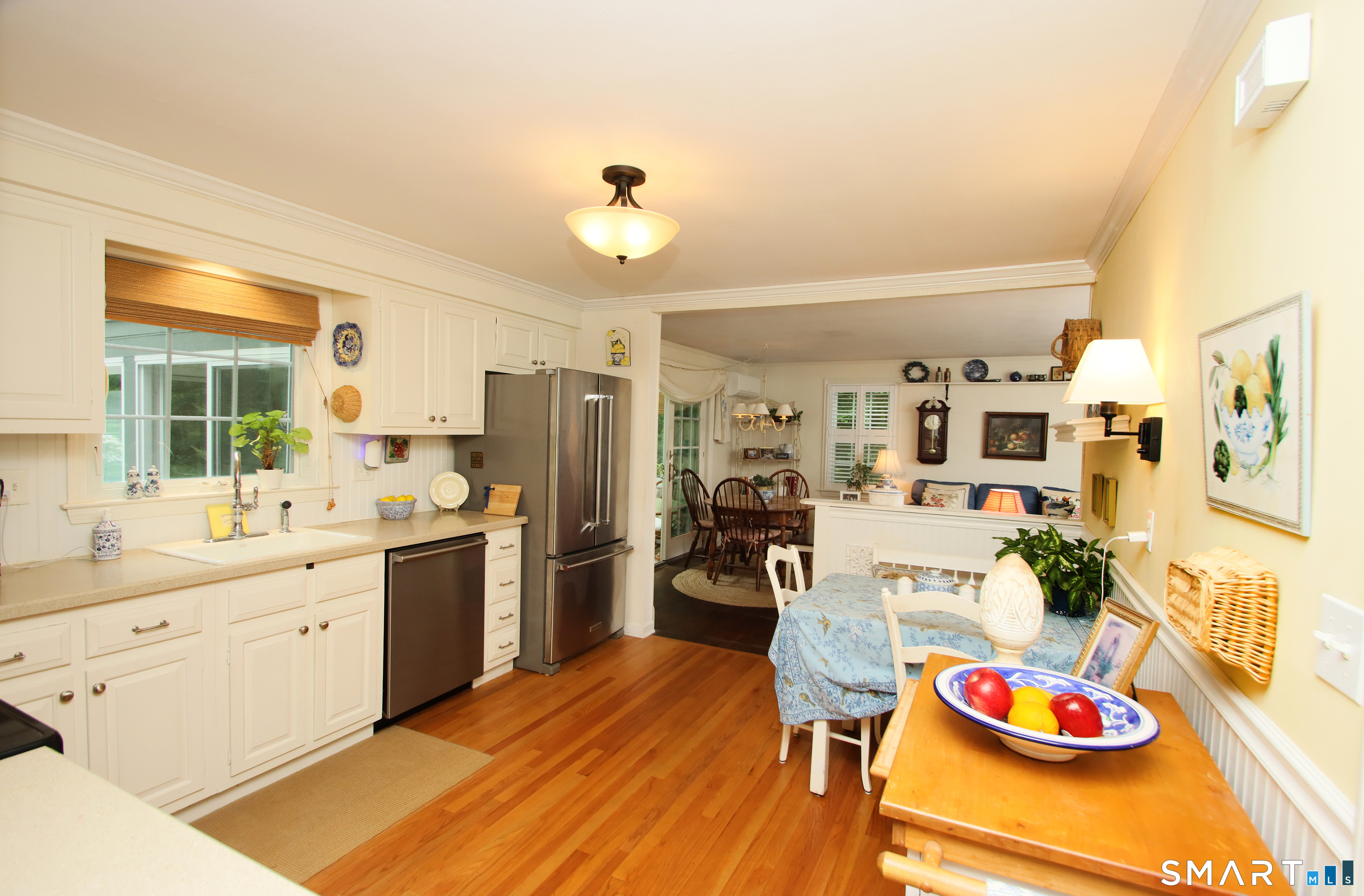 49 Hammonassett Meadows Road Madison, CT 06443 - Photo 6 of 31 The Kitchen opens to the Family Room