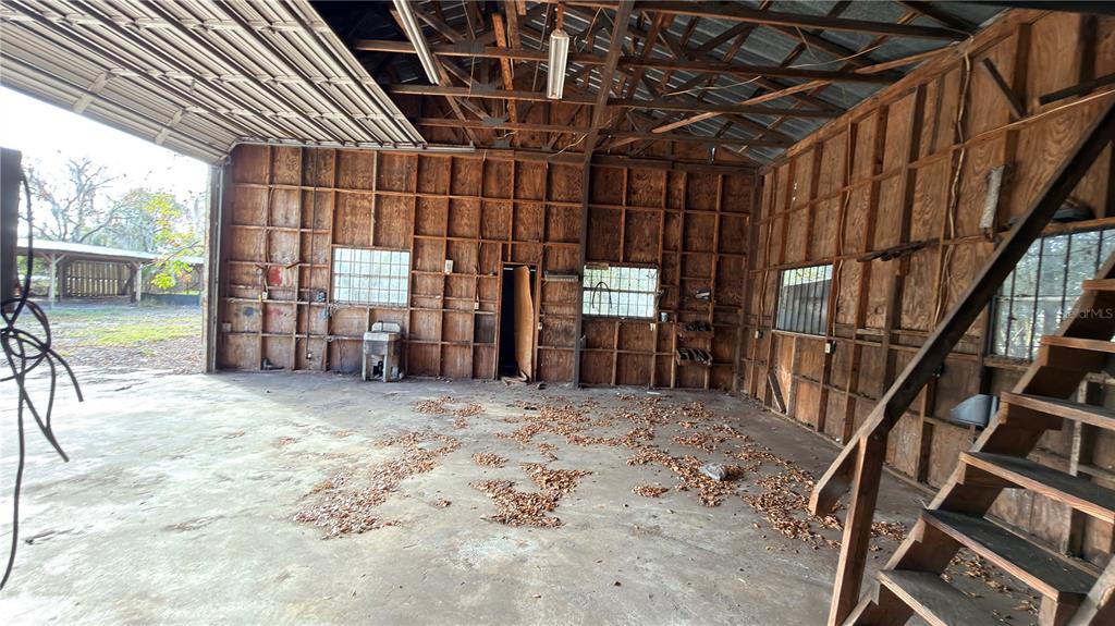 11 7th Street Southeast Fort Meade, FL 33841 - Photo 5 of 19 a view of an empty room with wooden floor