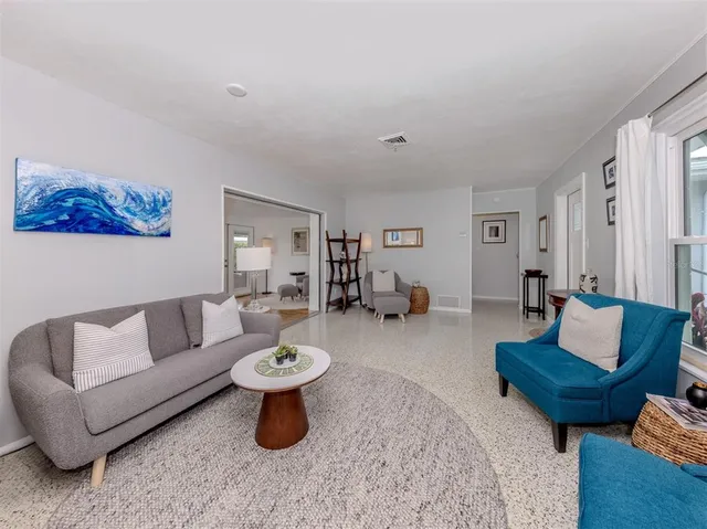 a living room with furniture and a couch