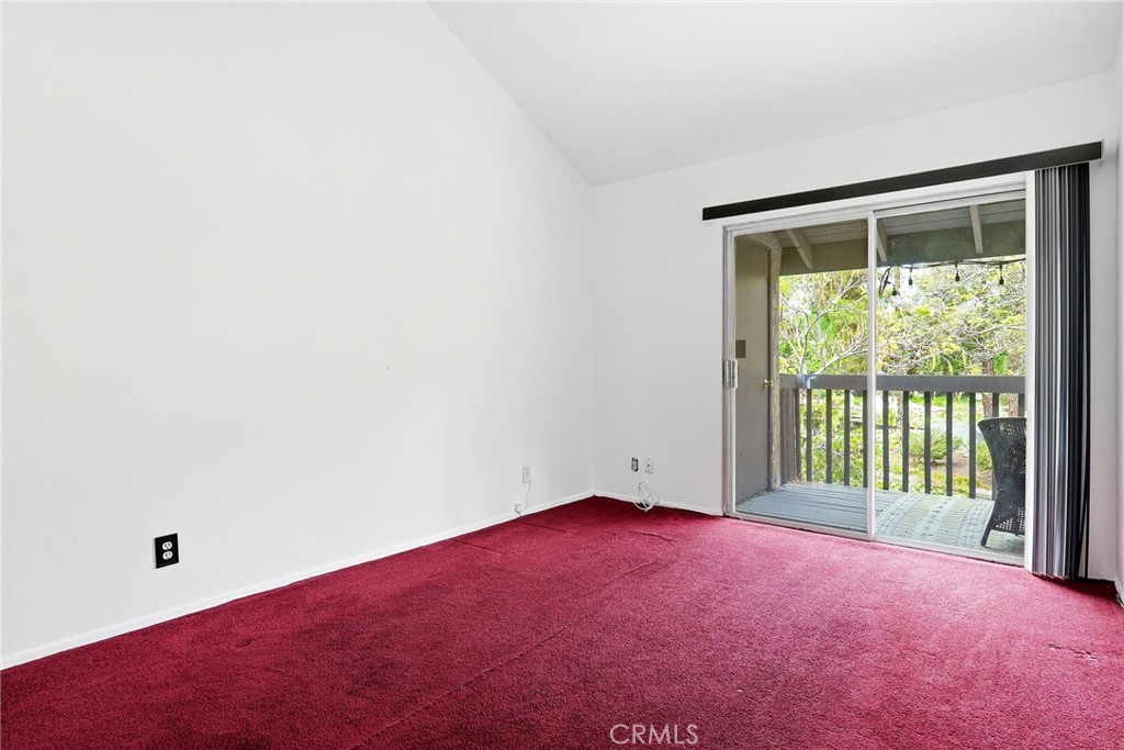 7890 East Spring Street, Unit 11E Long Beach, CA 90815 - Photo 26 of 40 an empty room with a window