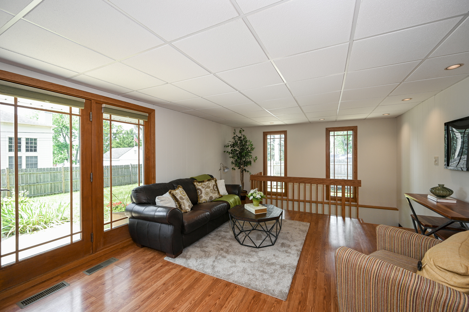 440 West Harrison Road Lombard, IL 60148 - Photo 13 of 26 a living room with furniture and a large window
