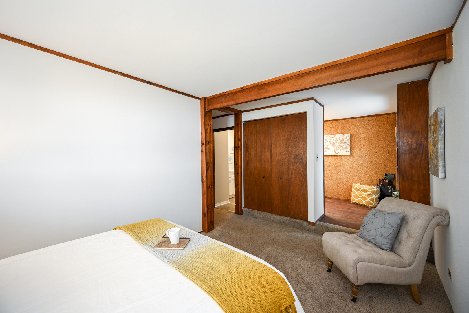 440 West Harrison Road Lombard, IL 60148 - Photo 15 of 26 a bedroom with a bed and a couch