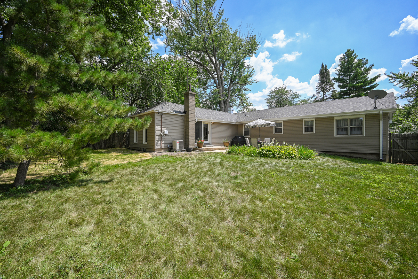 440 West Harrison Road Lombard, IL 60148 - Photo 26 of 26 a front view of house with yard and green space