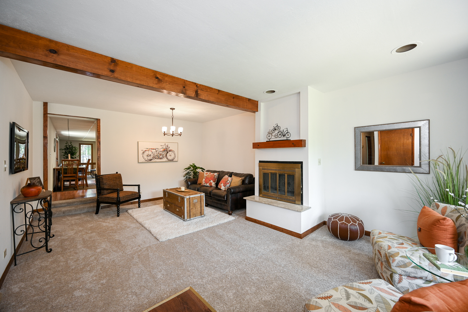 440 West Harrison Road Lombard, IL 60148 - Photo 6 of 26 a living room with furniture and a fireplace