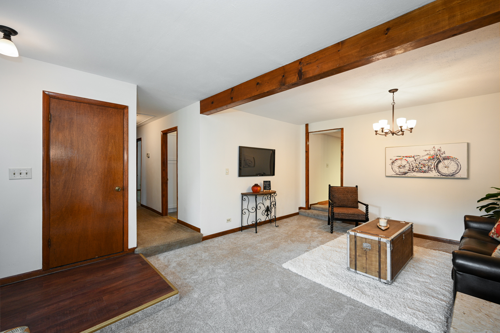 440 West Harrison Road Lombard, IL 60148 - Photo 7 of 26 a living room with furniture and a flat screen tv