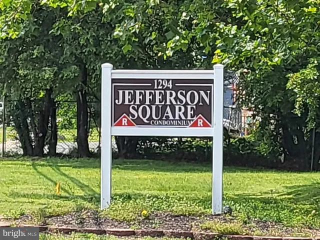 a sign on the side of the road