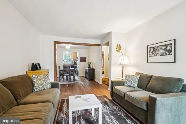 a living room with furniture and a couch