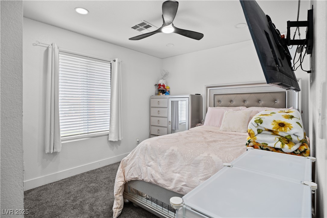 4231 Rimcrest Road Las Vegas, NV 89121 - Photo 29 of 52 Bedroom with carpet, recessed lighting, and a ceiling fan
