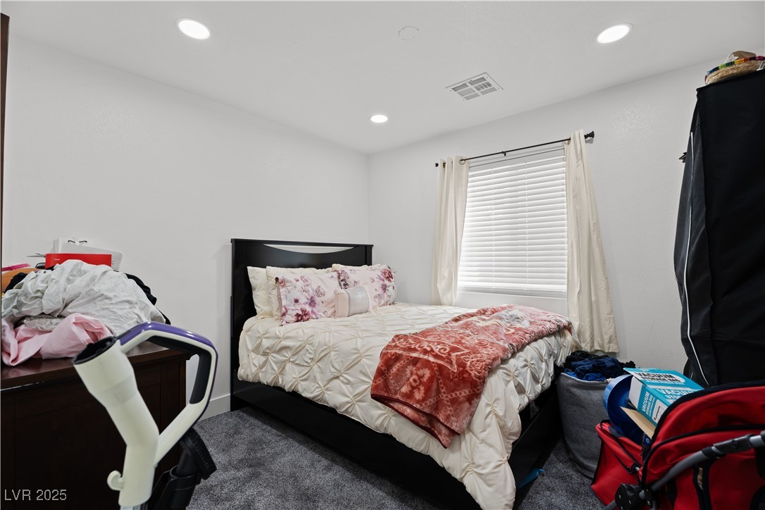 4231 Rimcrest Road Las Vegas, NV 89121 - Photo 31 of 52 Bedroom with carpet floors and recessed lighting