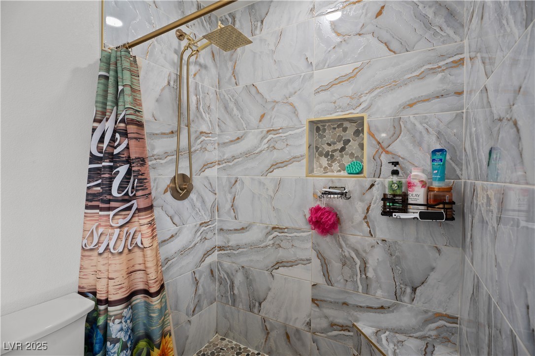 4231 Rimcrest Road Las Vegas, NV 89121 - Photo 38 of 52 Full bath with tiled shower and toilet