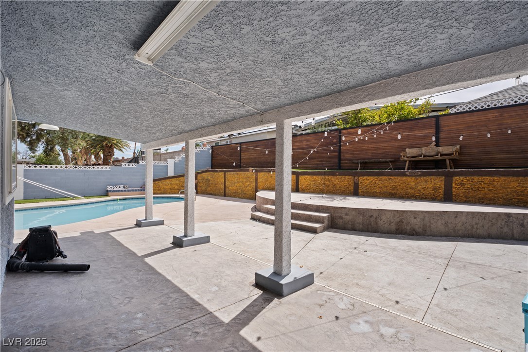 4231 Rimcrest Road Las Vegas, NV 89121 - Photo 39 of 52 Fenced backyard featuring a patio area