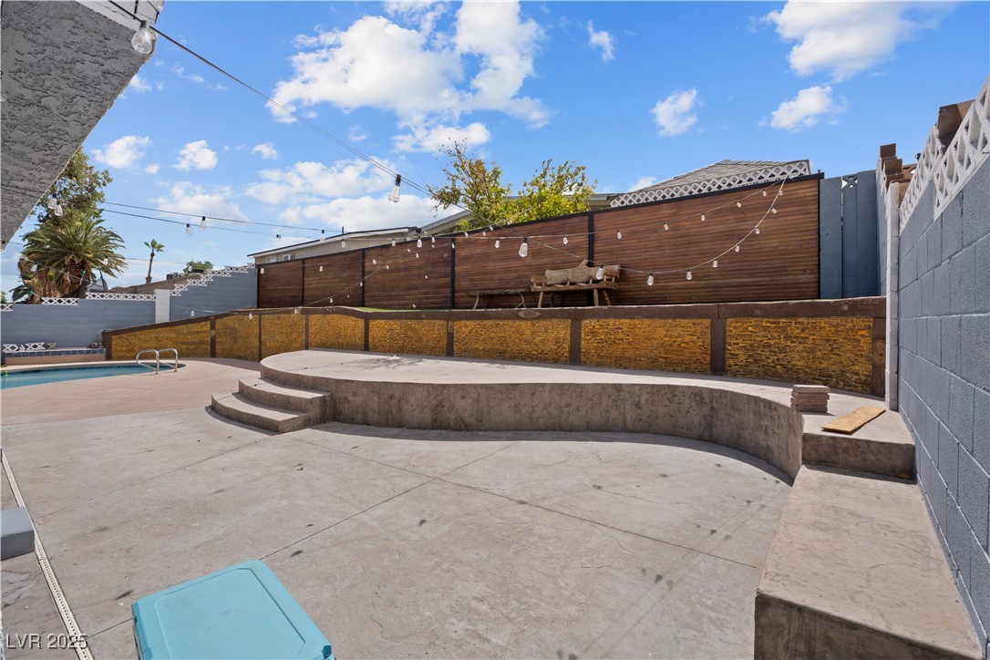 4231 Rimcrest Road Las Vegas, NV 89121 - Photo 40 of 52 Fenced backyard with a patio