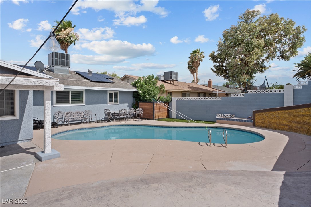 4231 Rimcrest Road Las Vegas, NV 89121 - Photo 42 of 52 View of pool with a fenced backyard and a patio