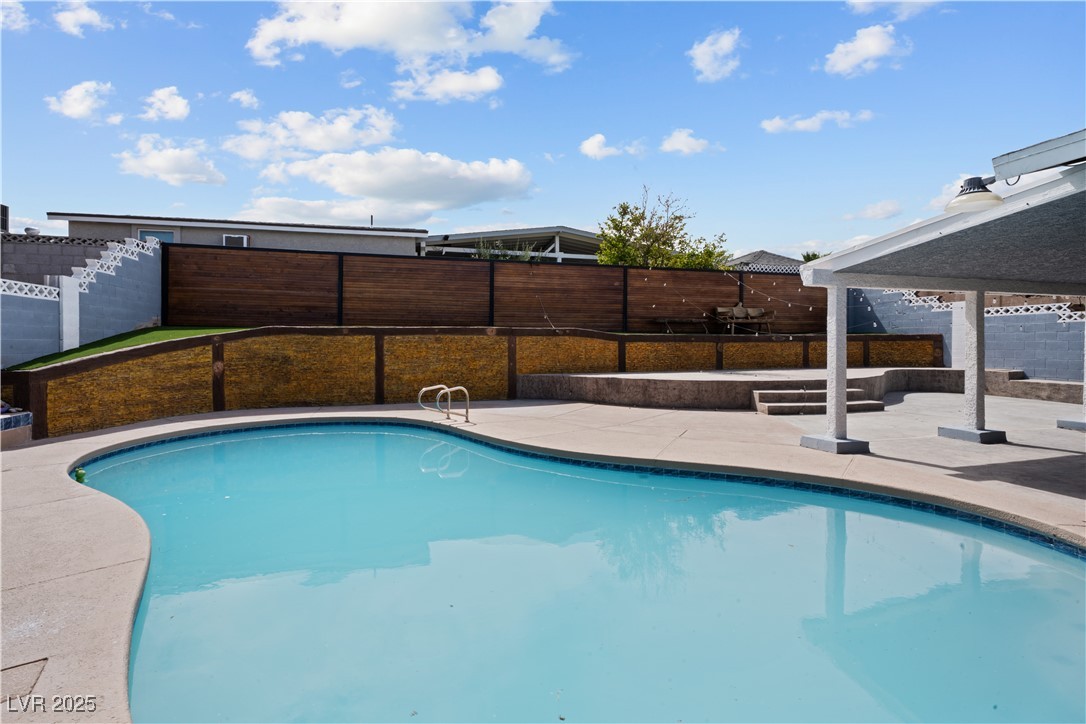 4231 Rimcrest Road Las Vegas, NV 89121 - Photo 45 of 52 View of swimming pool featuring a patio and a fenced backyard