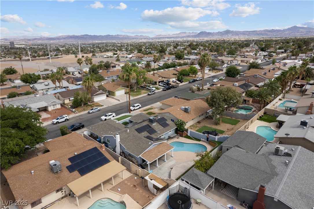 4231 Rimcrest Road Las Vegas, NV 89121 - Photo 50 of 52 Aerial perspective of suburban area featuring mountains
