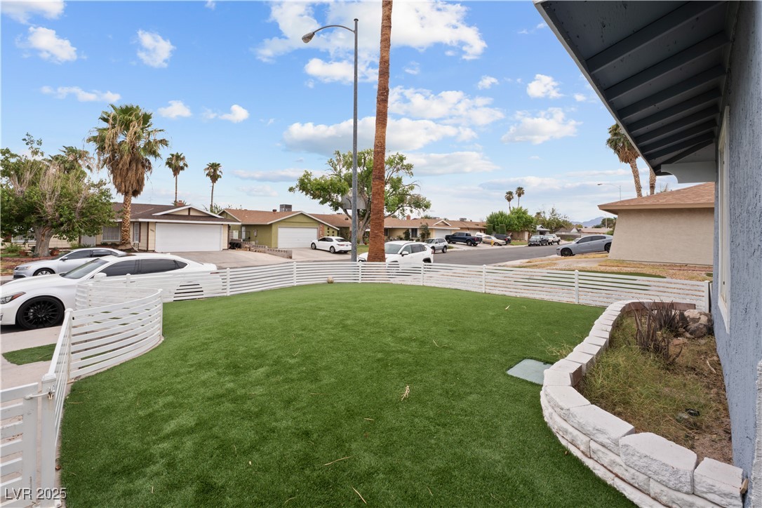 4231 Rimcrest Road Las Vegas, NV 89121 - Photo 8 of 52 View of yard featuring a residential view