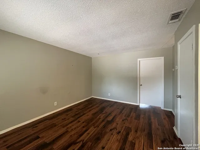 a view of small space with wooden floor