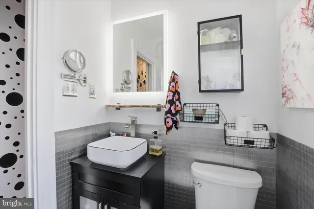 a bathroom with a bathtub and shower