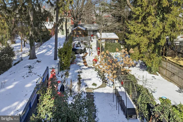a backyard of a house with outdoor seating