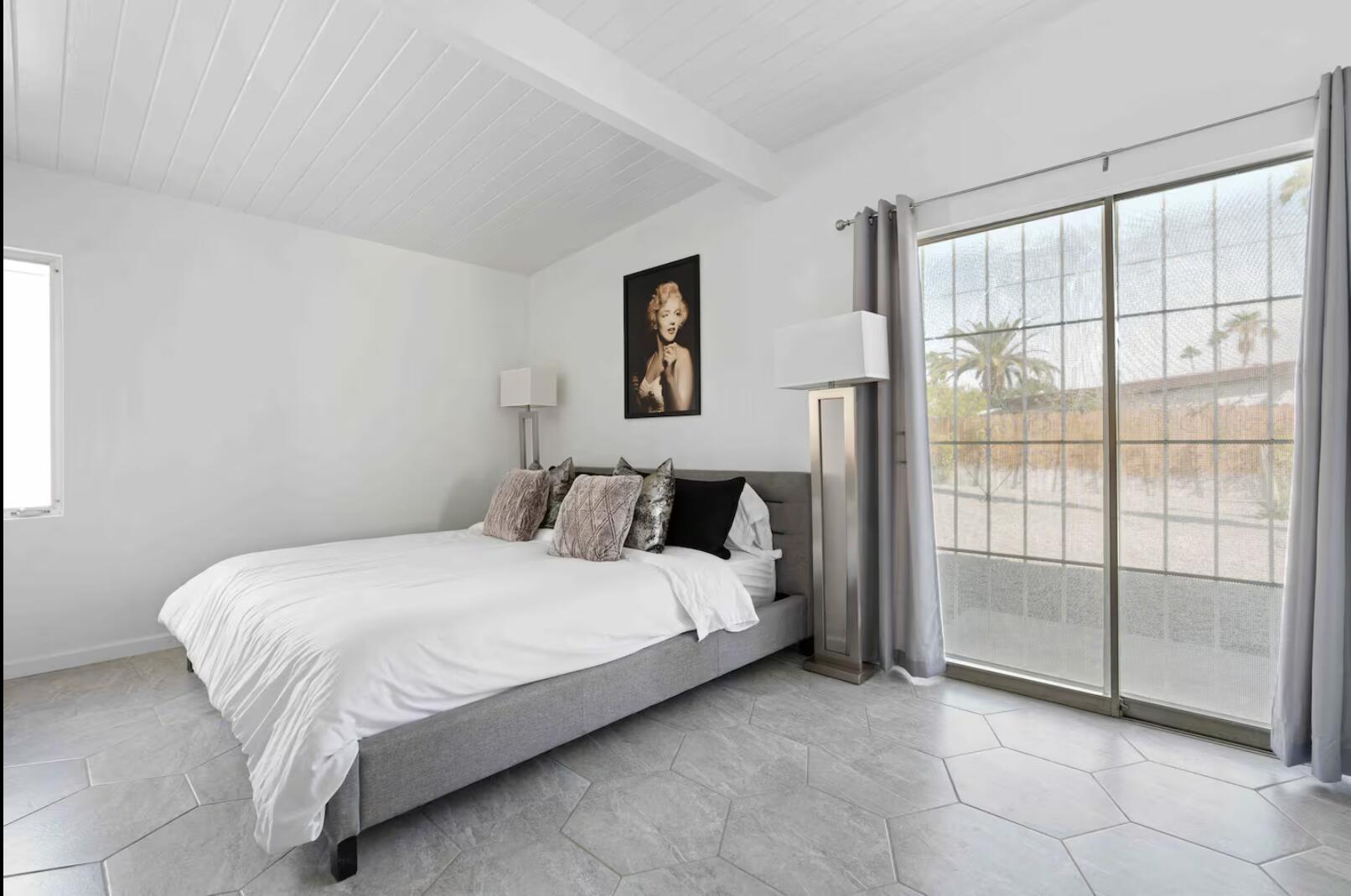 280 North Monterey Road Palm Springs, CA 92262 - Photo 14 of 29 a bedroom with a bed and a window