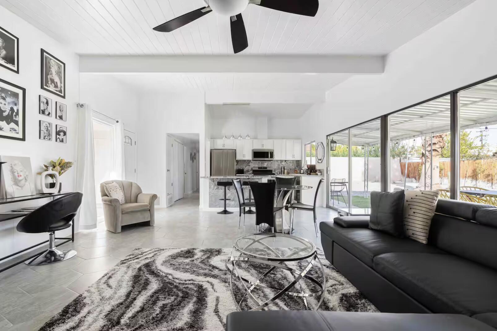280 North Monterey Road Palm Springs, CA 92262 - Photo 2 of 29 a living room with furniture and a large window